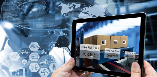 Industry 4.0,Augmented reality and smart logistic concept. Hand holding tablet with AR application for check order pick time in smart factory warehouse.Man use AR glasses and infographic background.
